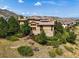 Luxury home with stone accents and mountain views at 8002 Galileo Way, Littleton, CO 80125