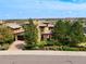 Stunning two-story home with a stone facade and manicured landscaping at 8002 Galileo Way, Littleton, CO 80125