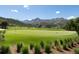 Putting green with scenic mountain backdrop at 8002 Galileo Way, Littleton, CO 80125