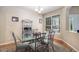 Dining room with seating for six at 14058 Elizabeth St, Thornton, CO 80602