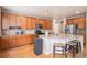 Kitchen with a large island and stainless steel appliances at 14058 Elizabeth St, Thornton, CO 80602