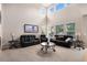 Bright living room with high ceilings and lots of natural light at 14058 Elizabeth St, Thornton, CO 80602