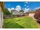 The home boasts a large backyard with lush green grass, perfect for outdoor activities and entertaining at 13112 Summit Grove Pkwy, Thornton, CO 80241