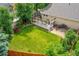 Expansive and well-manicured lawn with elevated deck, perfect for entertaining and relaxation at 13112 Summit Grove Pkwy, Thornton, CO 80241