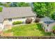 Well-maintained backyard with mature trees and storage shed at 13112 Summit Grove Pkwy, Thornton, CO 80241