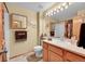 Well-lit bathroom with warm tones and a vanity provides a comforting space at 13112 Summit Grove Pkwy, Thornton, CO 80241