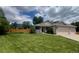 Charming single-Gathering home with manicured lawn and a spacious three-car garage at 13112 Summit Grove Pkwy, Thornton, CO 80241