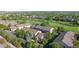 Aerial view of the community featuring lush green golf course at 3985 W 104Th Dr # E, Westminster, CO 80031