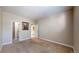 Neutral bedroom with carpeted floor and a private en-suite bathroom at 3985 W 104Th Dr # E, Westminster, CO 80031
