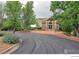 Clubhouse with easy access and a bike rack surrounded by beautiful trees and landscaping at 3985 W 104Th Dr # E, Westminster, CO 80031