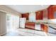 Sunlit kitchen boasts abundant counter space and direct access to the patio at 3985 W 104Th Dr # E, Westminster, CO 80031
