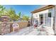 Private patio with stone accents, sliding glass door, and seating offers great outdoor space at 3985 W 104Th Dr # E, Westminster, CO 80031