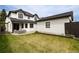 The backyard has a manicured lawn and patio area, perfect for outdoor entertaining at 2646 S Madison St, Denver, CO 80210