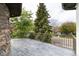 Enjoy the view from this balcony with stone floors and rod iron railings overlooking the beautiful tree lined street at 2646 S Madison St, Denver, CO 80210