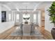 Dining room with modern chandelier and hardwood flooring at 2646 S Madison St, Denver, CO 80210