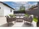 Outdoor patio with comfortable seating, perfect for relaxing and entertaining at 2646 S Madison St, Denver, CO 80210