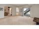 Expansive finished basement with walkout access, offering flexible space for living and entertaining at 15088 Verbena St, Thornton, CO 80602