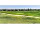 Scenic view of lush green golf course and surrounding homes at 15088 Verbena St, Thornton, CO 80602