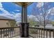 View from front porch looking out at the street and nearby trees at 15088 Verbena St, Thornton, CO 80602