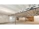 Spacious basement featuring a concrete floor and exposed ceiling at 5385 Trails Edge Ln, Castle Rock, CO 80104