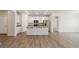 Open kitchen boasts stainless appliances, granite counters, and a large island at 5385 Trails Edge Ln, Castle Rock, CO 80104