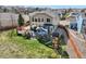 Aerial view of a home showcasing a spacious backyard with a hot tub and gazebo at 7378 Geode Ct, Castle Rock, CO 80108