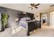 Spacious bedroom with a dark accent wall, offering an inviting and modern feel at 7378 Geode Ct, Castle Rock, CO 80108