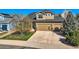 Inviting two-story home with a three-car garage and well-maintained landscaping at 7378 Geode Ct, Castle Rock, CO 80108