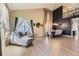 Open-concept living room and dining area with high ceilings and a seamless flow throughout at 7378 Geode Ct, Castle Rock, CO 80108