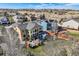 Aerial view of home featuring a private backyard, deck with pergola, pool, and large windows at 7378 Geode Ct, Castle Rock, CO 80108