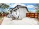Cozy backyard patio space, perfect for outdoor entertaining with a fire pit at 10759 Clermont St, Thornton, CO 80233