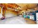 Spacious two car garage with ample storage and convenient door access at 10759 Clermont St, Thornton, CO 80233