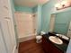 Bathroom featuring a tub/shower combo, modern vanity and neutral paint at 15700 E Jamison Dr # 3-202, Englewood, CO 80112