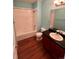Bathroom featuring a tub/shower combo, modern vanity and neutral paint at 15700 E Jamison Dr # 3-202, Englewood, CO 80112
