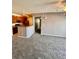 Open-concept living area at 15700 E Jamison Dr # 3-202, Englewood, CO 80112