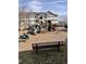 Community playground with various equipment near a multi-story apartment building at 15700 E Jamison Dr # 3-202, Englewood, CO 80112
