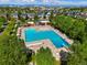 Aerial view of the community pool and recreation area, perfect for summer fun and relaxation at 8427 E 35Th Ave, Denver, CO 80238