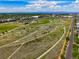 Scenic aerial view of park with walking paths and recreational areas and with city skyline in the distance at 8427 E 35Th Ave, Denver, CO 80238
