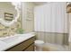 Bathroom features a decorative mirror and decorative accents at 8427 E 35Th Ave, Denver, CO 80238