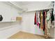 Walk-in closet is spacious with shelving and rod to maximize storage at 8427 E 35Th Ave, Denver, CO 80238