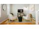 Cozy living room featuring neutral decor, sleek furnishings, and natural light at 8427 E 35Th Ave, Denver, CO 80238