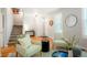 Inviting living room with hardwood floors, modern furnishings, and ample natural light at 8427 E 35Th Ave, Denver, CO 80238