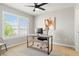 Office space filled with natural light from the window, with a modern desk at 8427 E 35Th Ave, Denver, CO 80238