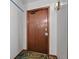 Exterior door with number in a condo hallway at 13950 E Oxford Pl # A-104, Aurora, CO 80014