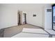 Modern bedroom with large windows offering city views and walk-in closet at 1625 Larimer St # 3004, Denver, CO 80202