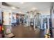 Well-equipped gym with weight machines, free weights, and mirrored walls at 1625 Larimer St # 3004, Denver, CO 80202