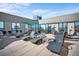 Relaxing rooftop lounge with city views provides comfortable seating and a shaded canopy at 1625 Larimer St # 3004, Denver, CO 80202