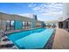 Rooftop pool with city views and plenty of lounge seating offers a relaxing oasis at 1625 Larimer St # 3004, Denver, CO 80202