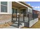 Elevated patio with stairs, modern railing and seating area at 23542 E Bailey Pl, Aurora, CO 80016