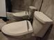 Bathroom featuring dual toilets with heated seats at 8822 E Florida Ave # G07, Denver, CO 80247